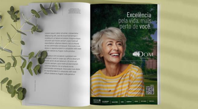 Mockup simulando a aplicação de um anúncio de revista criado pela Agência Ofício para a Dom Oncologia.